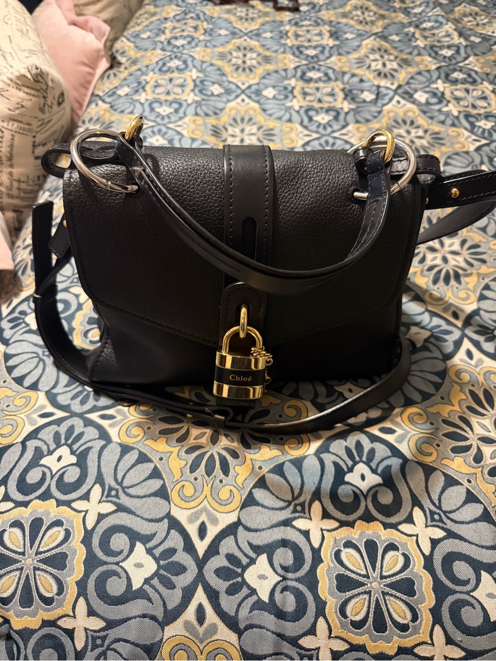 Chloé Black Leather Shoulder Bag with Gold Padlock Accent